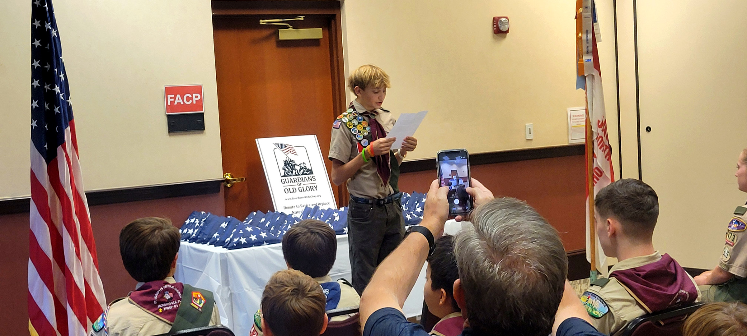 Scout speaking during the Jacksonville flag ceremony
