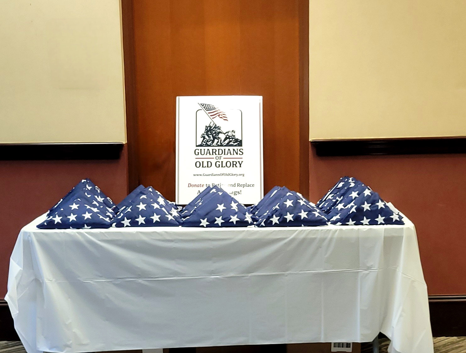 New American flags prepared for donation at the Jacksonville ceremony
